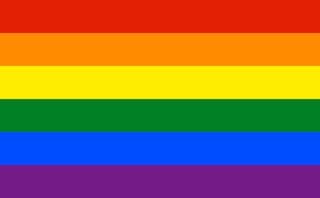 Pride_Flag.svg The lgbt flag is shown on a white background at a new england wedding.