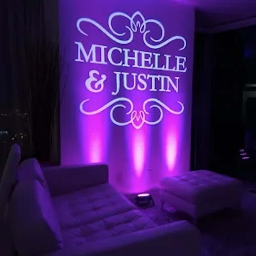 A purple led sign with the words Michelle and Justin, perfect for Maine DJs at a New England wedding.