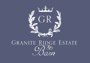 logo-granite-ridge-estate Logo for Granite Ridge Estate & Barn featuring a crown and wreath design on a blue background.
