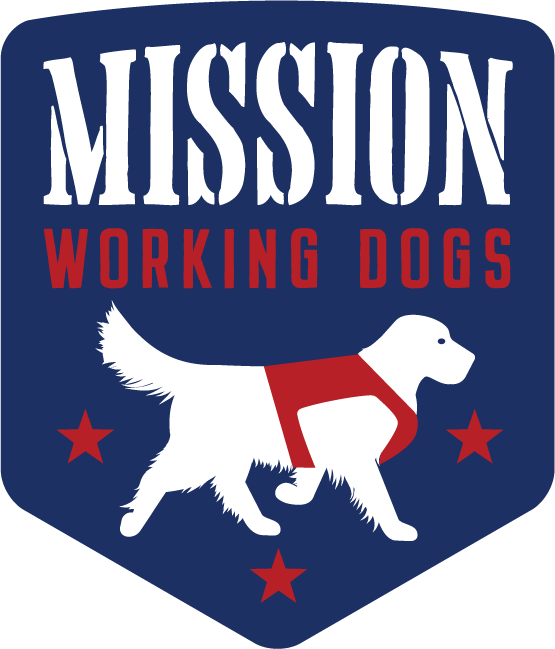 mission-working-dogs-logo Logo for "Mission Working Dogs" featuring a white dog wearing a vest, surrounded by four red stars, on a blue shield background with bold white and red text.