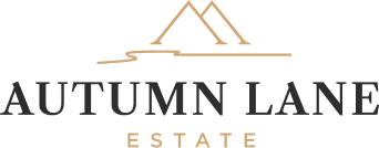 Autumn Lane Estate logo with stylized gold lines forming a mountain above bold black text and smaller gold “Estate” text below.